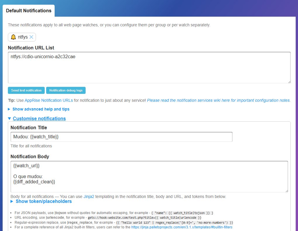 A tela Default Notifications do changedetection.io com a URL ntfys com o tópico, o título Mudou: {{watch_title}} e o corpo com {{watch_url}} e {{diff_added_clean}}